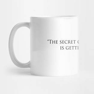 The secret of getting ahead Mug